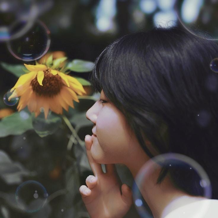 Alex Carter, Lead Design Curator at CalmClarityMindWay, reviewing corporate floral arrangements